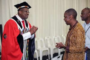 Acting UKZN VC Prof Nana Poku greets Dr Protas Madlala