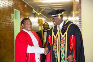 Honorary Graduate Dr Willie Bester shares a lighthearted moment with UKZN Acting VC Prof Nana Poku