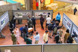 People engage with the exhibit
