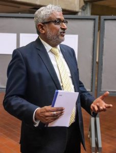 Professor Michael Samuel opens the exhibit of his student Mrs Bridget Horner